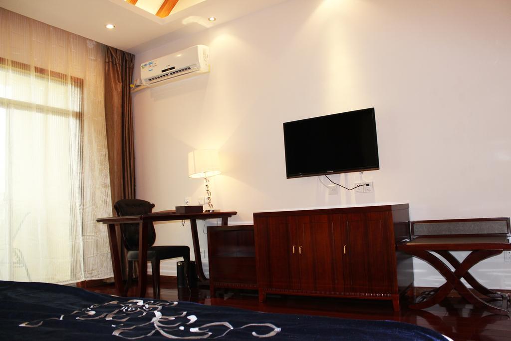 Golden Peacock Resort Hotel Beira Habitación foto